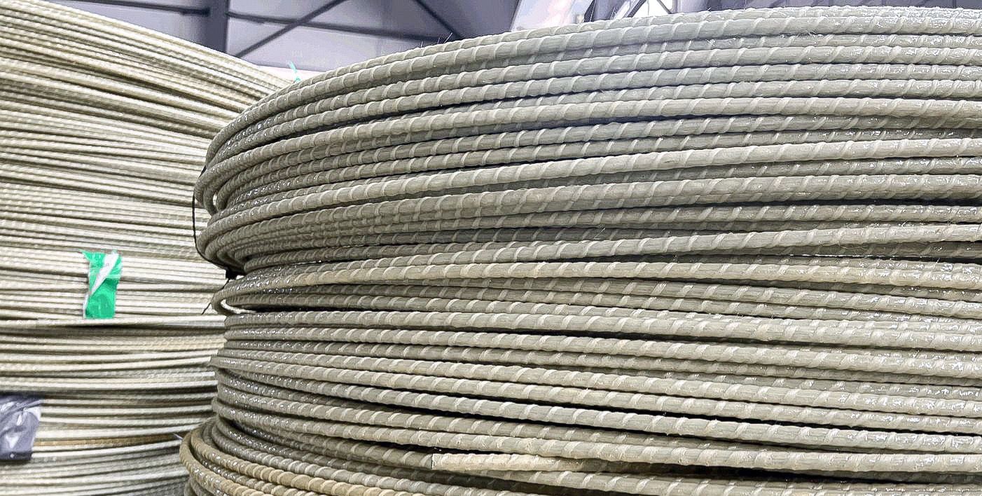 Close-up of coiled fiberglass rebar spools