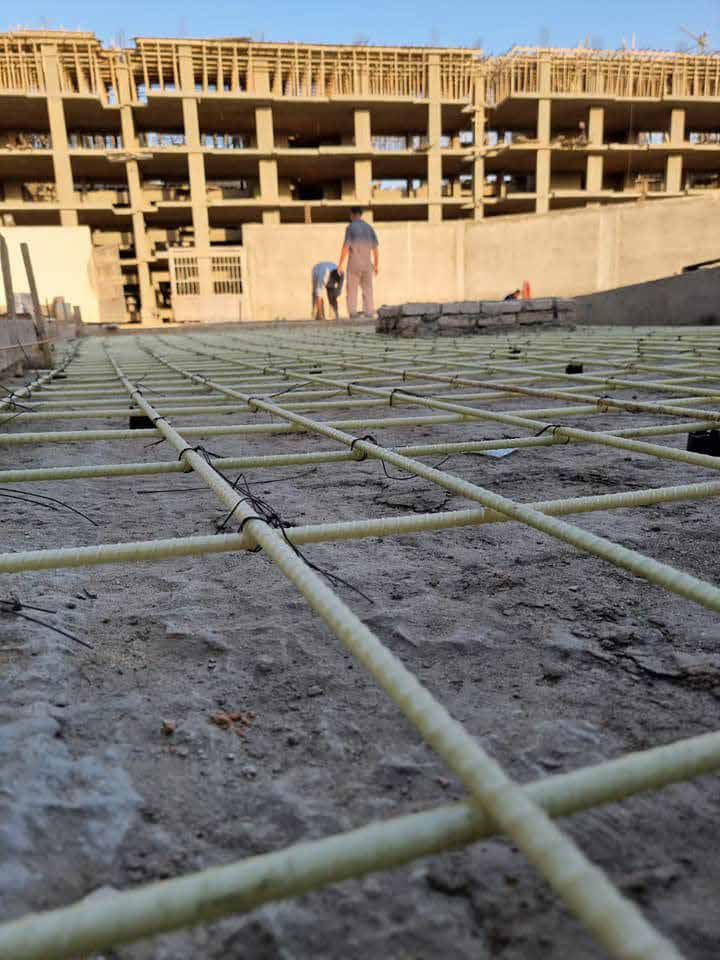 FRP rebar mesh laid in concrete slab at building site, Egypt